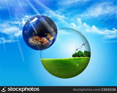 ball inside lawn, trees and wind turbines