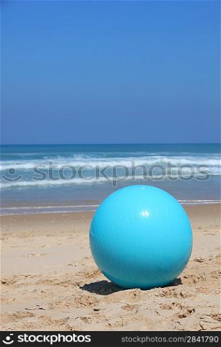 Ball left on a beach