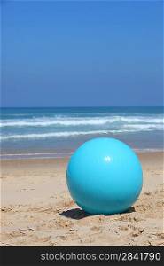 Ball left on a beach