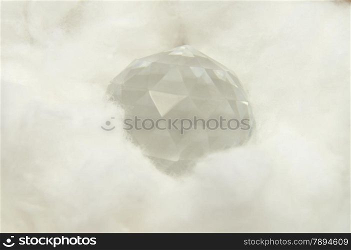 Ball of glass in cotton