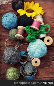 ball of knitting yarn and sewing accessories