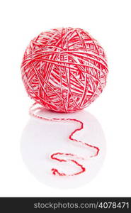 Ball of knitting yarn on a white background