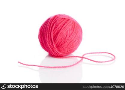 Ball of knitting yarn on a white background