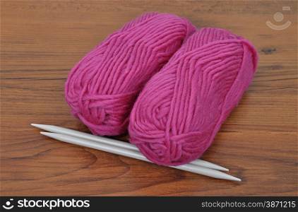 Ball of wool with knitting needles