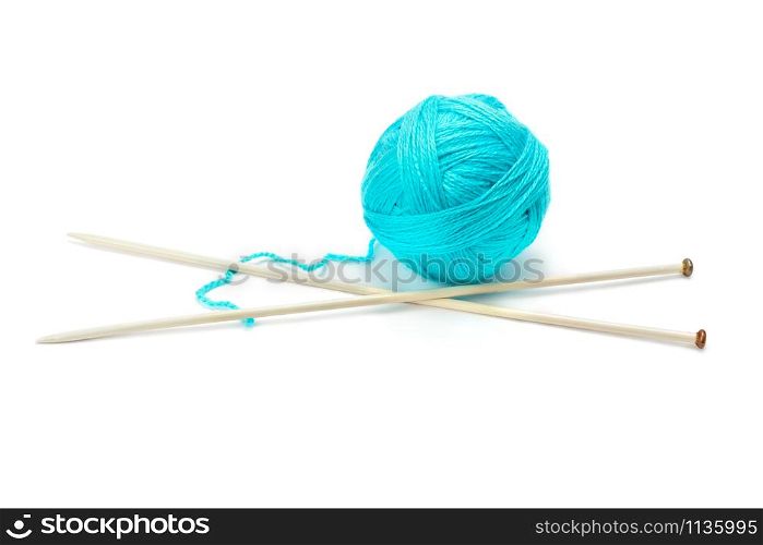 Ball of woolen thread and knitting needles isolated on white background. The concept is hobbies and handicrafts.