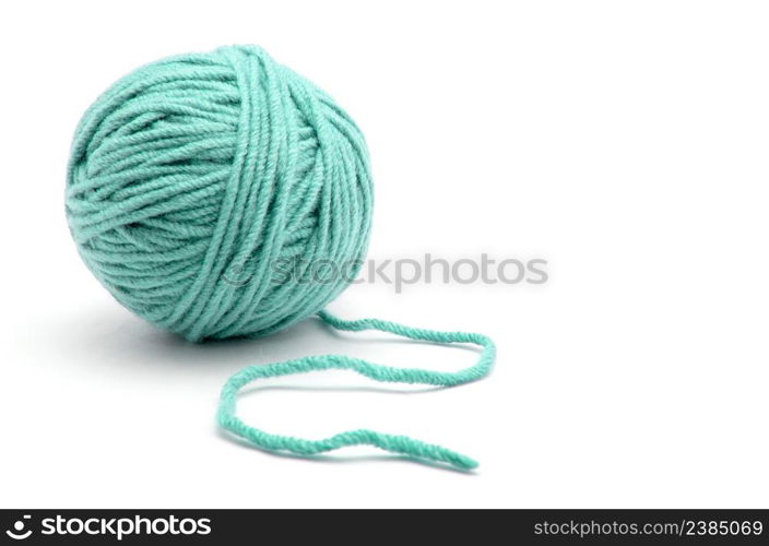 Ball of yarn on white background