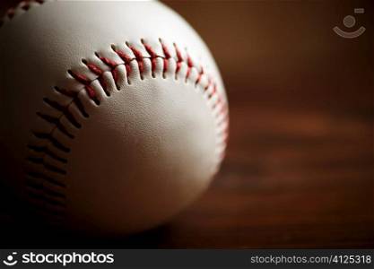 ball on wooden background ,sport concept in closeup, selective focus