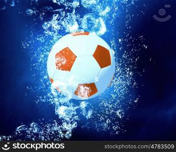Ball under water. Soccer ball sink in clear blue water
