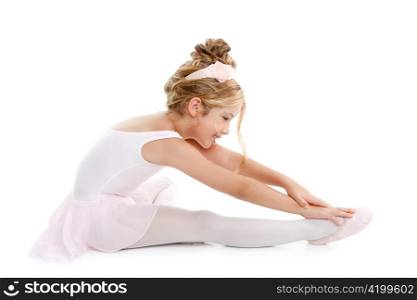 Ballerina little ballet children dancer stretching sitting on white floor