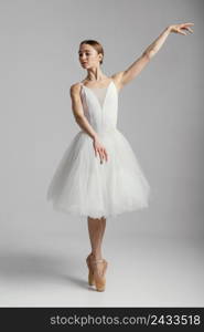 ballerina standing with pointe shoes