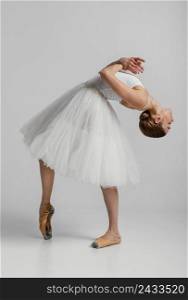 ballerina wearing beautiful white dress full shot