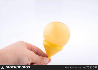 Balloon in a funnel on white background