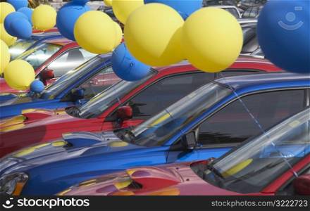 Balloons at a Car Lot