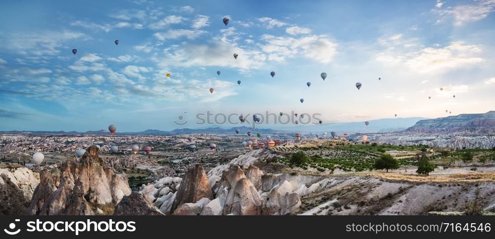 Balloons in the sky over Cappadocia. Goreme, Turkey. Logos and trademarks removed.. Balloons in the sky over Cappadocia