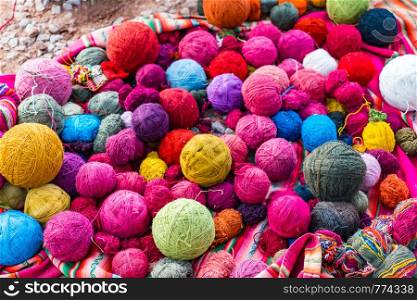 Balls of wool natural dyeing in a woven factory at Cusco, Peru