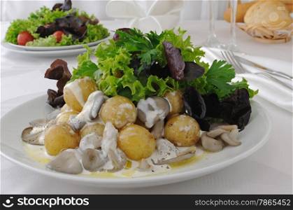 Balls potatoes with mushrooms and cream sauce