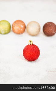 Balls with snow for the Xmas tree decoration