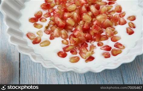 Balsamic Pomegranate Labneh , Middle Eastern cuisine Levant, Traditional assorted dishes, Top view