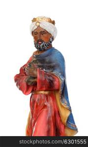 Baltasar, one of the three wise men. Ceramic figure isolated on white background