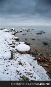 Baltic Sea in winter. snow on a background of water