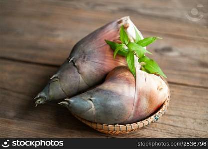 Bamboo shoots on wooden table background, Fresh raw bamboo shoot for cooking food in thailand