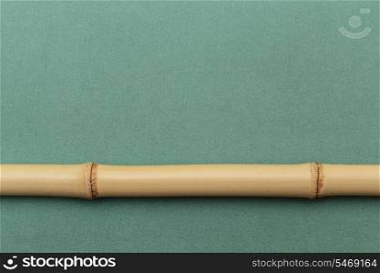 bamboo stick on a green background
