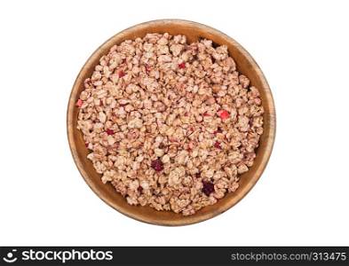 Bamboo wood bowl with natural organic granola cereal summer fruits flakes on white.Top view