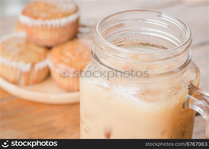 Banana muffins and iced coffee, stock photo