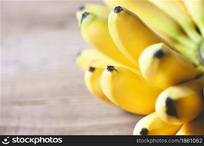 Banana tropical fruit on wooden background, fresh ripe banana