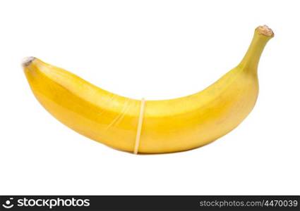 banana with condom isolated on white