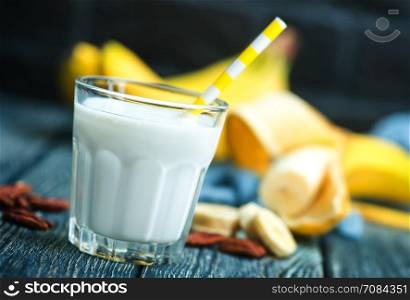 banana yogurt with nuts in the glass