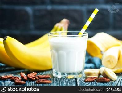 banana yogurt with nuts in the glass