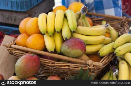 bananas mangos and orange fruit