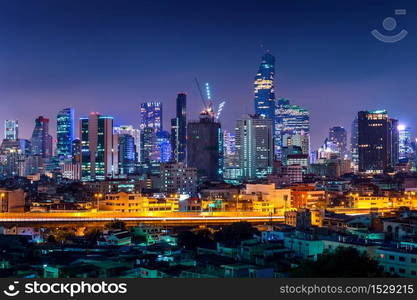 Bangkok cityscape and traffic at night in Thailand.