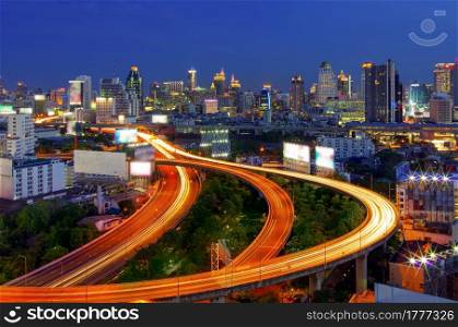 Bangkok cityscape. Traffic on the freeway in the business district. at dusk.. Bangkok Traffic