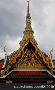 bangkok in temple thailand abstract cross colors roof wat asia sky and colors religion mosaic rain