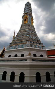 bangkok in temple thailand abstract cross colors roof wat palaces asia sky and colors religion mosaic rain