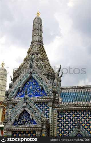 bangkok in temple thailand abstract cross colors roof wat palaces asia sky and colors religion mosaic rain