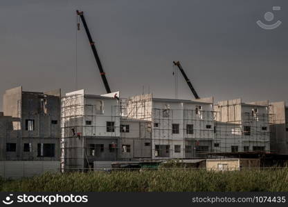 Bangkok, thailand - 06 Nov, 2019 : Construction of new house in new residential area, construction worker on construction site new building.