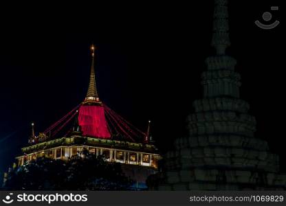 Bangkok, Thailand - 07 Nov. 2019 : Nighttime of Beautiful wat saket ratchaworamahawiharn (the golden mount), Here It is the most tourist destination landmark in Phra Nakhon district. copy space.