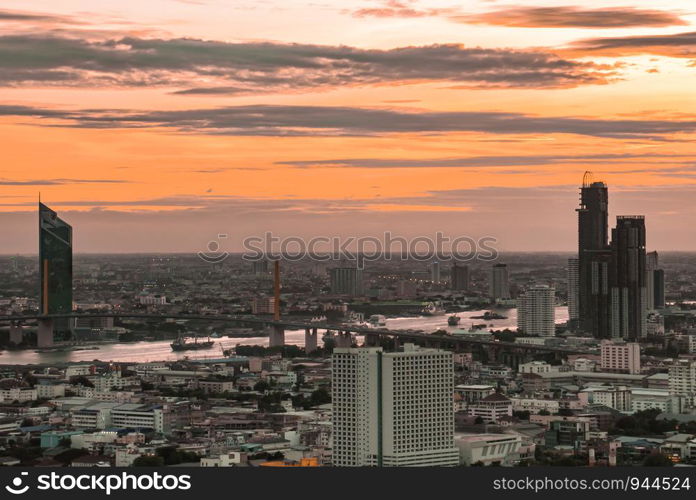 Bangkok, Thailand - 07 Sep, 2019 : Beautiful view of Bangkok city, Beauty skyscrapers along Chaopraya river in the evening, making the city modern style. Copy area.focus and blur.