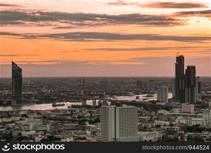 Bangkok, Thailand - 07 Sep, 2019 : Beautiful view of Bangkok city, Beauty skyscrapers along Chaopraya river in the evening, making the city modern style. Copy area.focus and blur.
