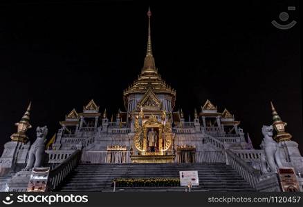 Bangkok, Thailand - 13 Dec 2019 : Wat Traimitr Temple or Wat Traimit Withayaram Worawihan Temple and also known as The Temple of the Golden Buddha largest in the world at Yaowarat Road in the night time, One of the landmark in Bangkok.