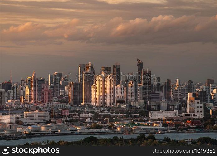 Bangkok, Thailand - 27 Aug, 2019 : Beautiful view of Bangkok city, Beauty skyscrapers along Chaopraya river in the evening, making the city modern style. Copy area.