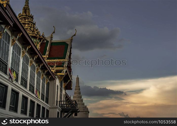 Bangkok, Thailand 27 Oct, 2019 : The beauty of The Temple of the Emerald Buddha (Wat Phra Kaew) and the Grand Palace at twilight, This is an important buddhist temple and a famous tourist destination, It is located in the historic centre of Bangkok.