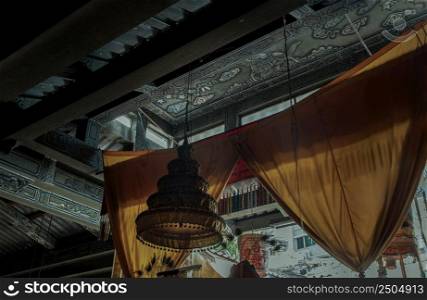 Bangkok, Thailand - Apr 29, 2022 : Architecture interior of Traditional chinese shrine with Traditional chinese lantern at Phutthamonthon sathan or Sun wukong shrine. Selective focus.