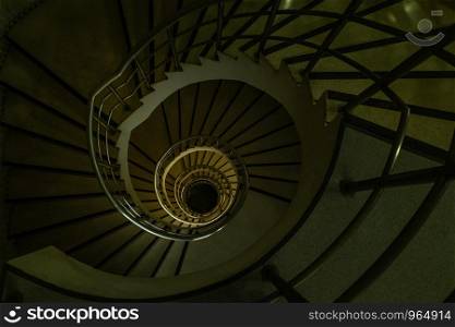 Bangkok, thailand - Aug 04, 2019 : View down of the spiral staircase inside the historic building.