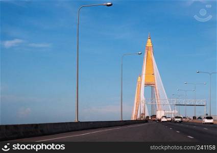 Bangkok, Thailand - Bangkok light traffic on kanchanaphisek bridge or Industrial ring road bridge. Morning warm light Chao Praya River