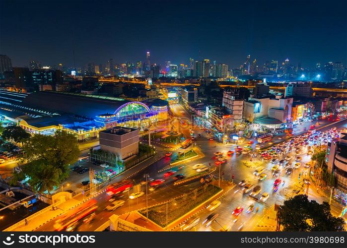 BANGKOK, THAILAND-Dec 1, 2018: traffic at Hua Lamphong intersection and Hua Lamphong railway station at night in Bangkok, Thailand
