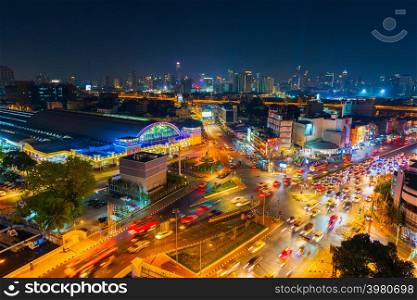 BANGKOK, THAILAND-Dec 1, 2018: traffic at Hua Lamphong intersection and Hua Lamphong railway station at night in Bangkok, Thailand